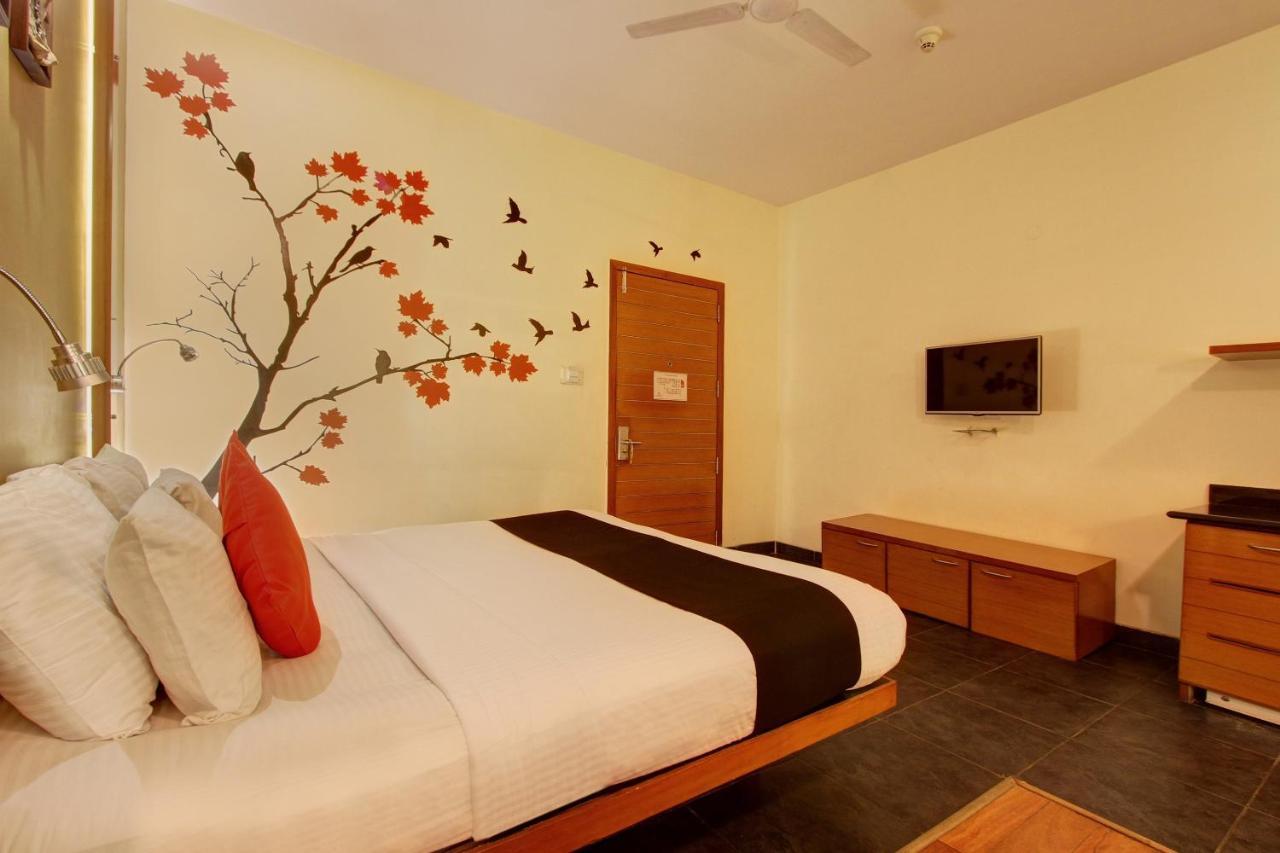 Capital O 16165 Cartier Hotel Bangalore Bilik gambar