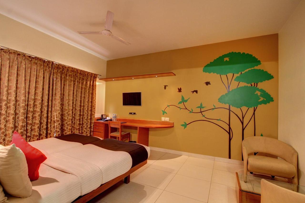 Capital O 16165 Cartier Hotel Bangalore Bilik gambar