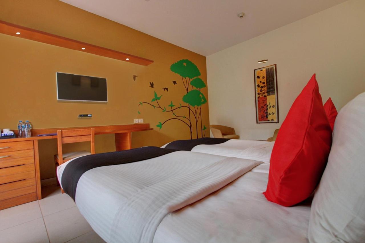 Capital O 16165 Cartier Hotel Bangalore Bilik gambar