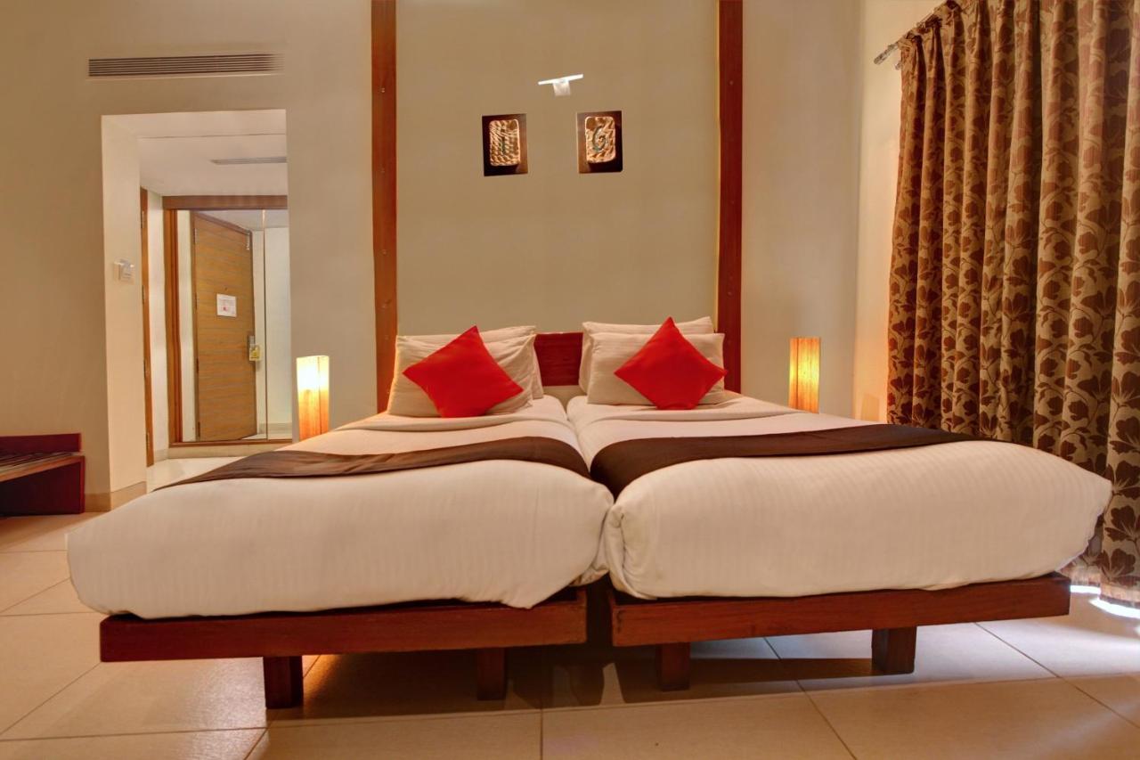 Capital O 16165 Cartier Hotel Bangalore Bilik gambar
