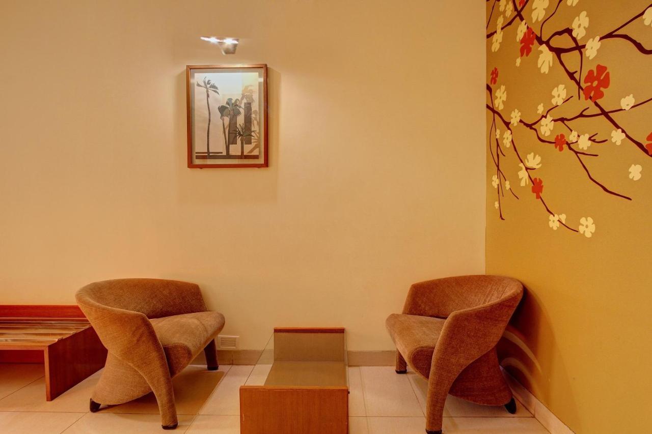 Capital O 16165 Cartier Hotel Bangalore Bilik gambar